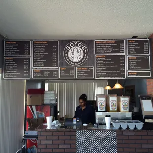 The menu. Up high. Not friendly for those with vision issues. Dine in &amp; Carry out order here, right next to door. Awkward.