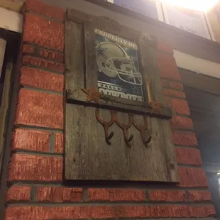 Dallas Cowboys fans! This was INSIDE and has been taken down. A TV replaced the space.