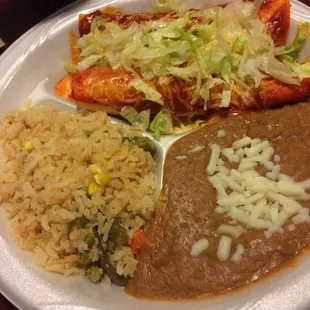 Chicken enchilada combination plate.