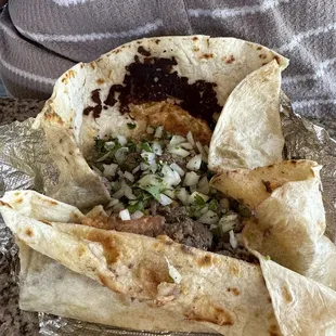 Opened burrito / breakfast / don goyo . I switched sausage for carne asada .