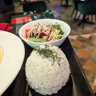 Rice and salad as sides