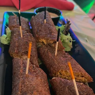 This was an appetizer, tasted like seasoned ground beef with a lightly breaded outside served with French dressing