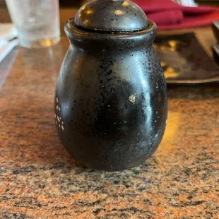 Dirty soy sauce bottle.