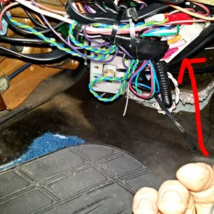 This is the horrible work GP Customs did,Wires hanging. used t taps &amp; electrical tape on this mess!Worst install I&apos;ve ever seen!