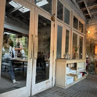 The outdoor seating, in the front of the restaurant