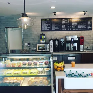 a counter with a laptop on it