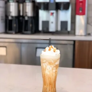 a iced coffee on a counter