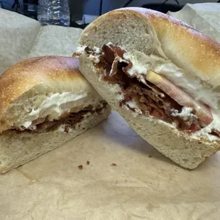 Cream cheese, tomato and bacon sandwich on a plain bagel, the breakfast menu is available all day.