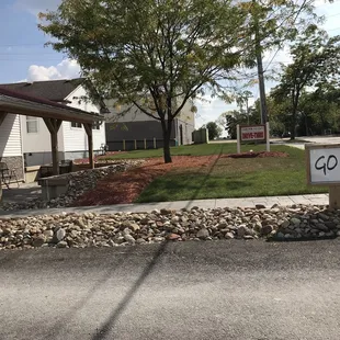 a sign in front of a building
