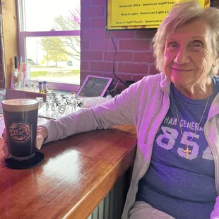 Grandma trying some beer!