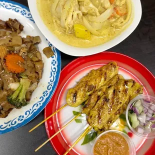 Pad see ew- medium spicy, chicken satay, chicken yellow curry- medium spice