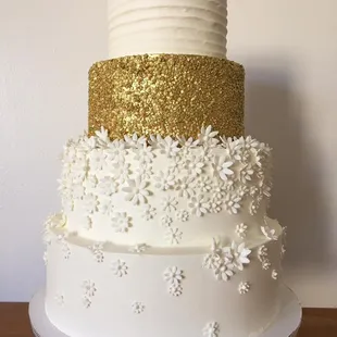 Simple gold and white wedding cake
