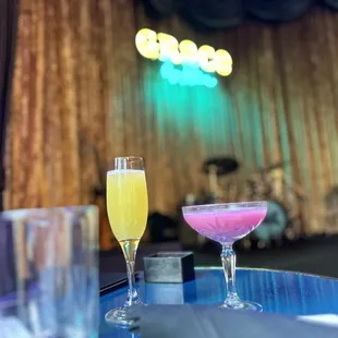 two cocktails on a table