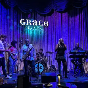 a group of people on stage