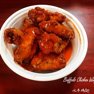 a bowl of chicken wings