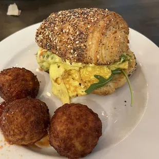 Everything Croissant Breakfast Sandwich with Cheesy Hashbrown bites.