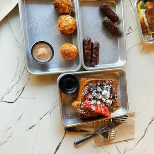 Berry French toast, pork sausage and hash brown bites.