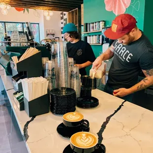 a bari serving a cup of coffee