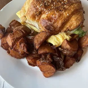 Croissant breakfast sandwich with sausage
