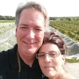 On the balcony overlooking the vines at Grace Hill Winery.