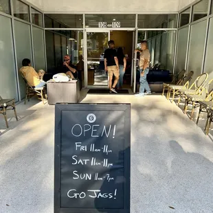 open sign in front of building