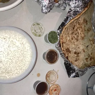 Thick roti and salty samosas.
