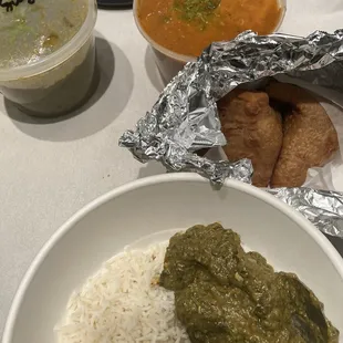 Salty samosas and chicken saag and sweet curry.