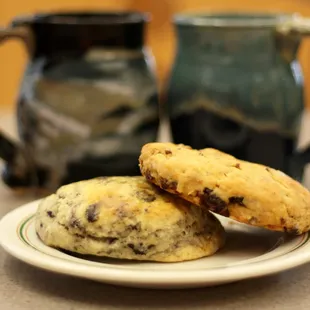 two chocolate chip cookies on a plate