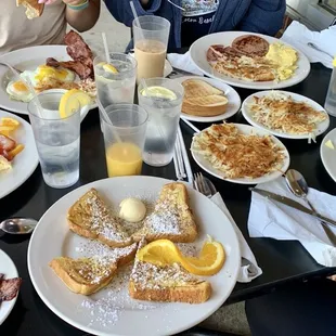 a table full of breakfast foods