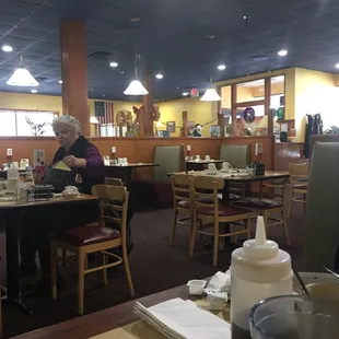 a woman sitting at a table