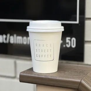 a cup of coffee on a table