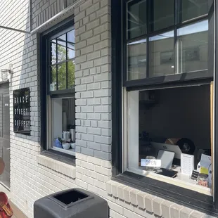 a woman looking out of a window