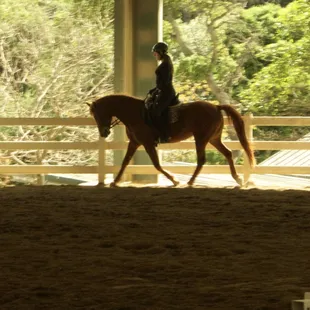 Vedra and I riding in the large covered arena