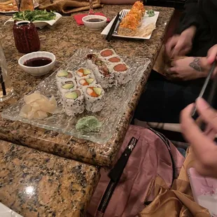 a group of people sitting at a table