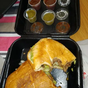 Lunch with a skinny thin carne asada torta and one old green salsa, the other 3 looked fresh.