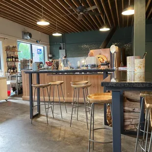 Order at the counter then sit at the bar stools and watch the magic happen. Easy to get a seat on Sat night.