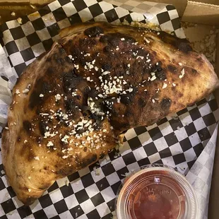 a slice of pizza in a box