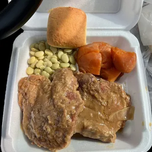 a meal in a styrofoam container
