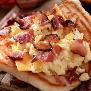 Pancake breakfast taco , scrambled eggs bacon and cheese ! Or custom your combination