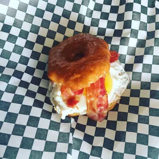 The dep! Glazed donut , sunny side egg and bacon!