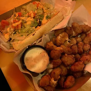 Chopped cheese ($9) and cheese curds ($6)