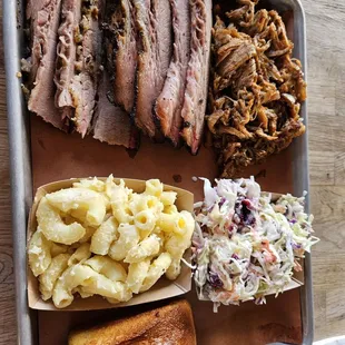 Brisket with Cole slaw, macaroni, corn bread and 1/4 pound of pulled pork on the side.