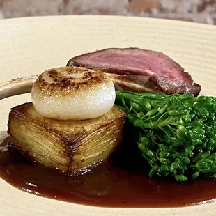 Roasted lamb chop, potato pave, broccolini, veal reduction