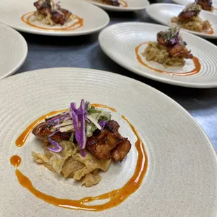 Harissa chicken thigh, citrus braised fennel, chili carrot vinaigrette, jicama salad