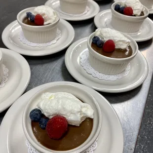 Chocolate pot de creme, cream, fresh berries