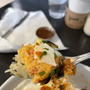 A bite of my hash brown bowl.