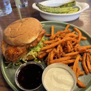 Gochujang Chicken Sandwich with Sweet Potato Fries and a side of Asparagus