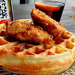 a plate of fried chicken and waffles