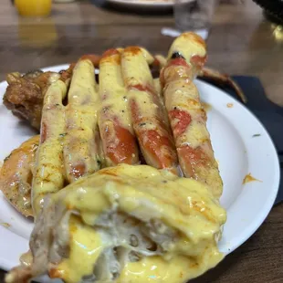 Garlic crab legs in garlic butter .