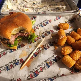 a burger and tater tots